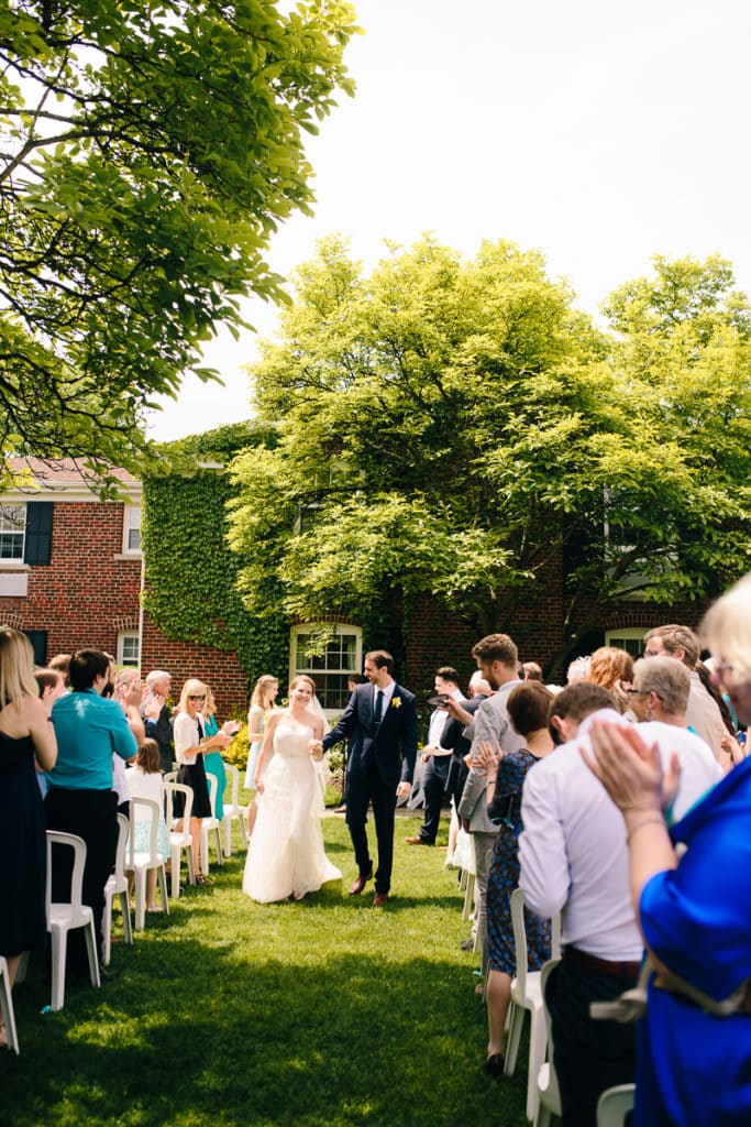 Wedding Ceremony in the rose garden at Pillar & Post