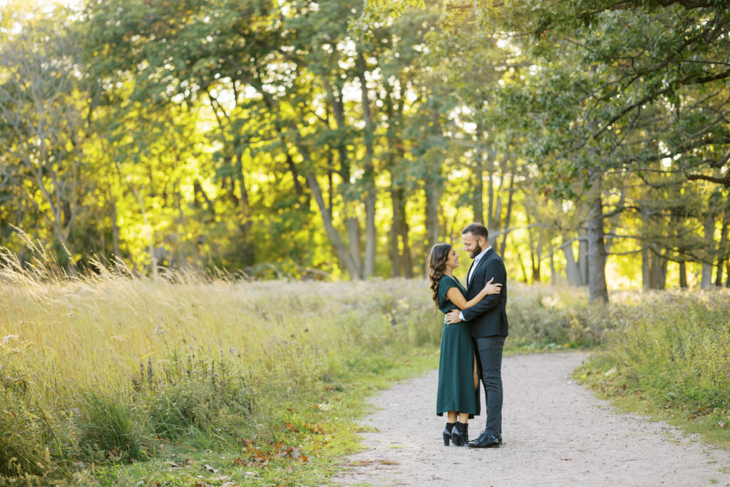 Couple posing together at Princess Point in Hamilton by Niagara Wedding Photographer