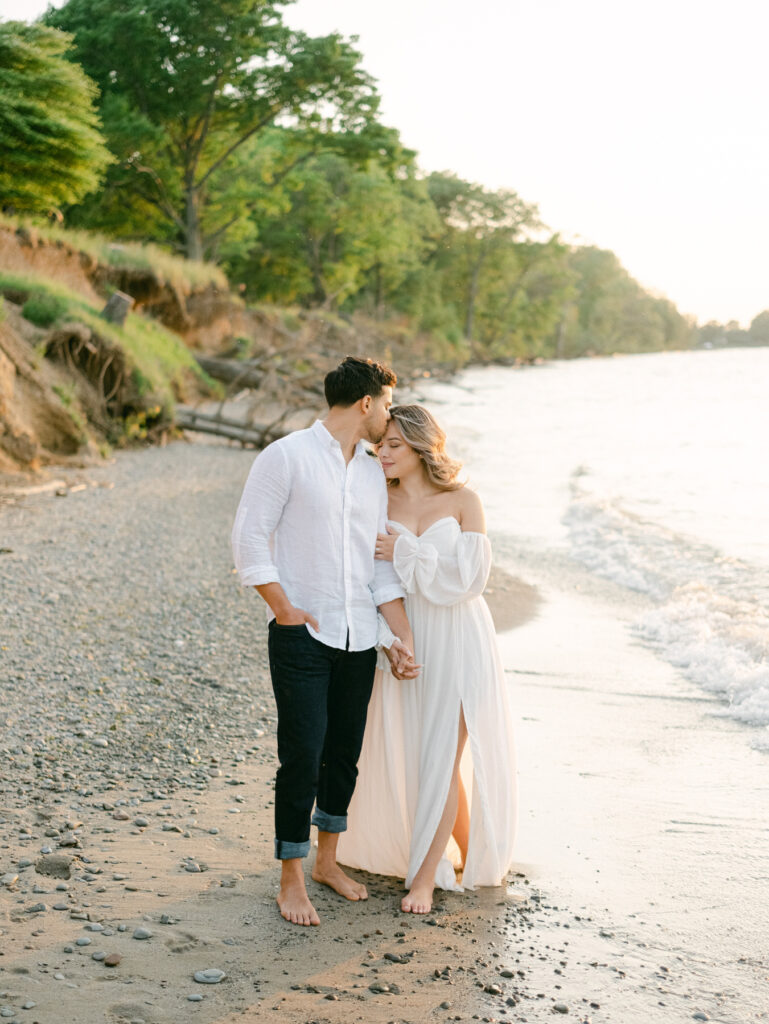 Romantic Engagement Photo At Sunset on beach in Niagara On The Lake