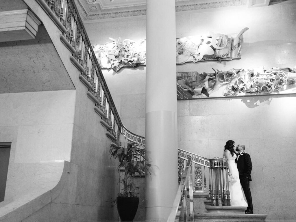 Black and white Wedding Photos on the stairs at One King West